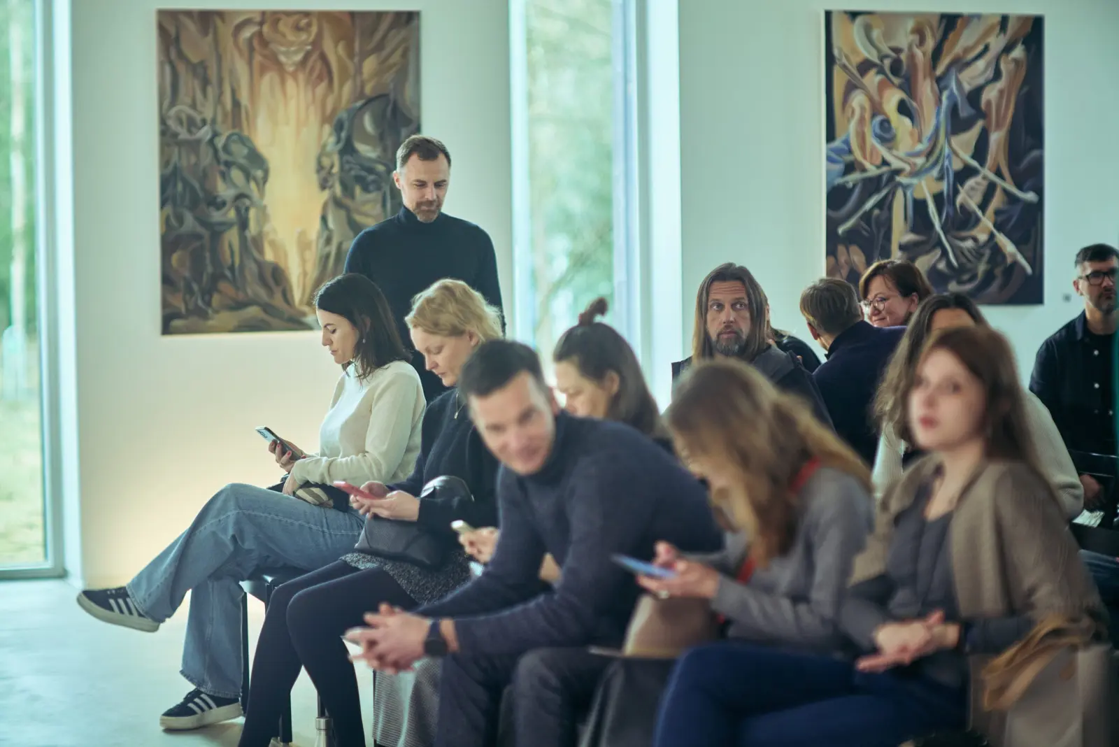 Audience gathered for a talk at Dimension of the Heart