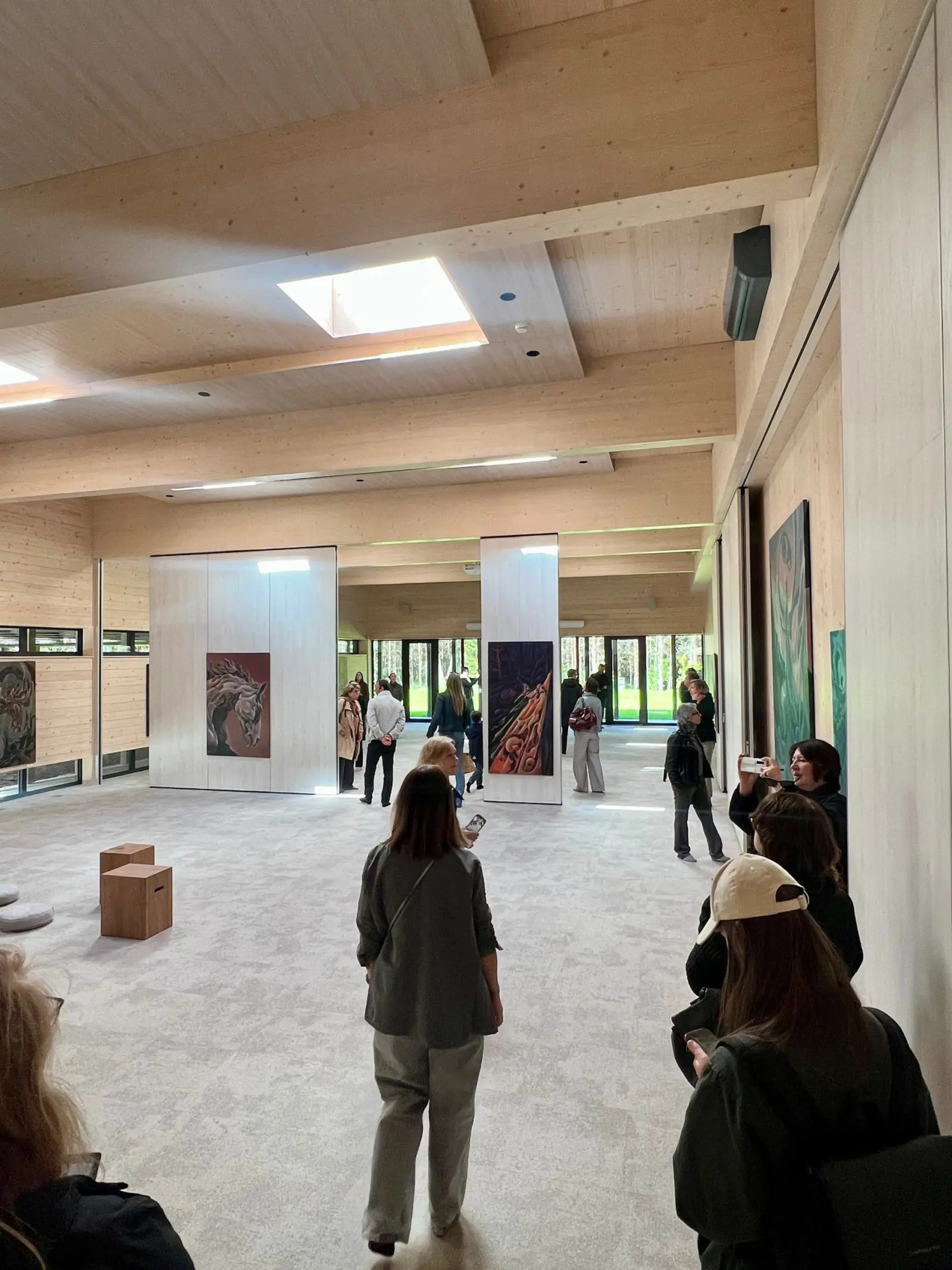 Visitors exploring the spacious Nuoramos exhibition hall