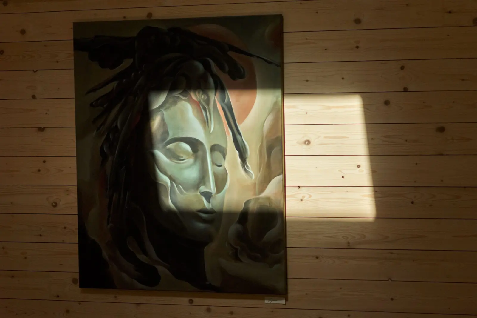 Sunlight falling across a painting at Nuoramos